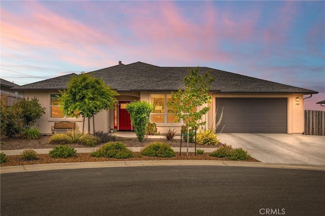 1982 Dawncrest Dr, Chico, CA 95928 - ranch-style home featuring concrete driveway, a garage, stucco siding, and fence