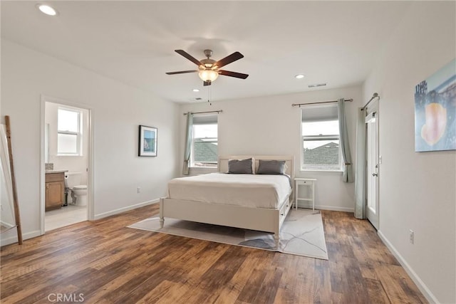 1982 Dawncrest Dr, Chico, CA 95928 - bedroom with recessed lighting, visible vents, wood finished floors, and baseboards