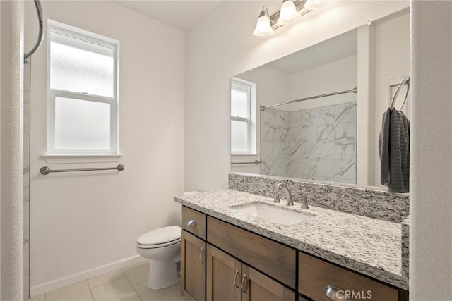 1982 Dawncrest Dr, Chico, CA 95928 - bathroom featuring a shower, baseboards, toilet, tile patterned floors, and vanity