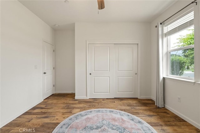1982 Dawncrest Dr, Chico, CA 95928 - unfurnished bedroom featuring baseboards, wood finished floors, and a closet