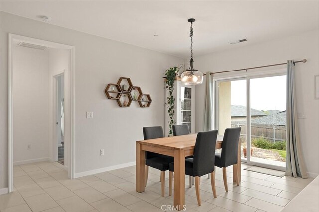1982 Dawncrest Dr, Chico, CA 95928 - dining space with visible vents, a chandelier, and baseboards