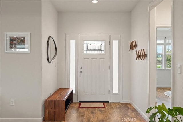1982 Dawncrest Dr, Chico, CA 95928 - entryway featuring baseboards, recessed lighting, wood finished floors, and a healthy amount of sunlight