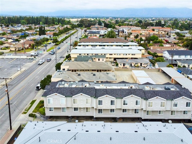 birds eye view of property featuring a residential view and a mountain view