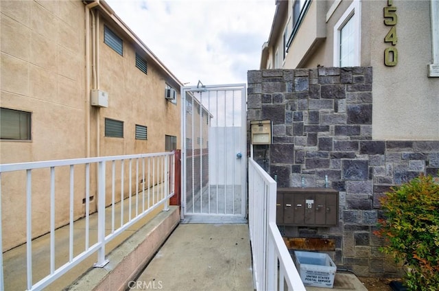 exterior space featuring a wall unit AC