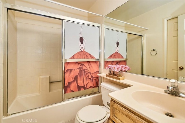full bathroom featuring toilet, shower / bath combination with glass door, and vanity