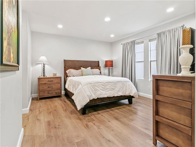 bedroom featuring recessed lighting, baseboards, and light wood finished floors