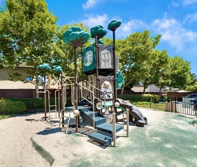 community jungle gym with fence
