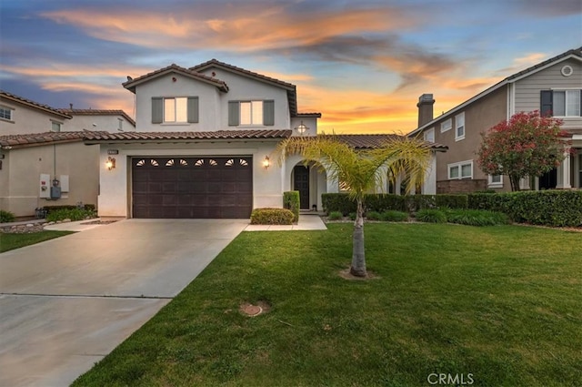 45798 Cloudburst Ln, Temecula, CA 92592 - mediterranean / spanish-style house with driveway, a lawn, stucco siding, and a garage