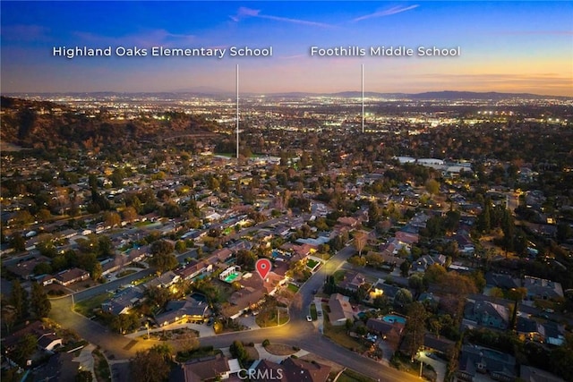 view of aerial view at dusk