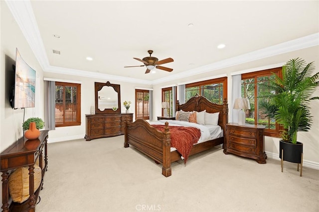 bedroom featuring baseboards, light carpet, and crown molding