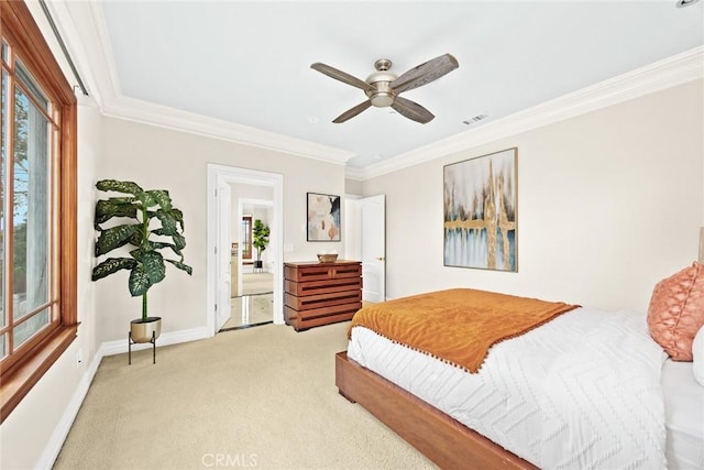 bedroom featuring crown molding, visible vents, baseboards, light carpet, and a ceiling fan