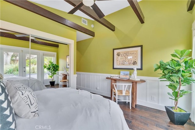 bedroom with vaulted ceiling with beams, visible vents, french doors, wainscoting, and wood finished floors