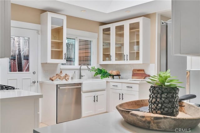 bar with a sink, recessed lighting, dishwasher, and tasteful backsplash