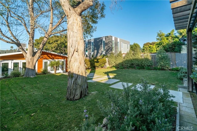 view of yard featuring fence