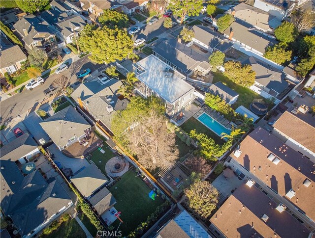 birds eye view of property with a residential view