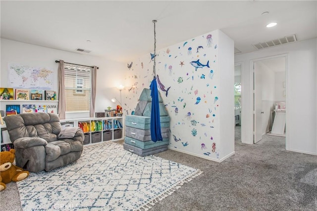 playroom featuring carpet floors, baseboards, and visible vents
