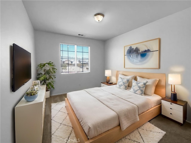 bedroom featuring visible vents and carpet