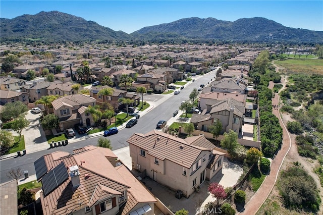 birds eye view of property featuring a mountain view and a residential view
