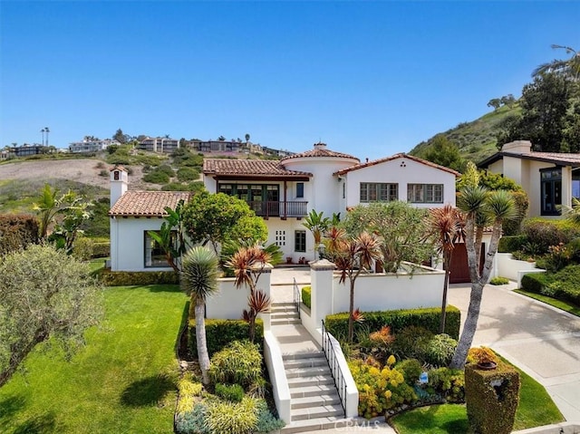 2839 Via Victoria, Palos Verdes Estates, CA 90274 - mediterranean / spanish home featuring stairs, stucco siding, a tile roof, and a chimney