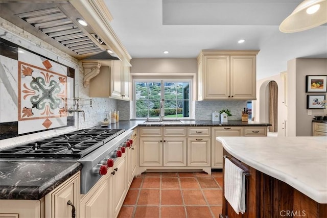 2839 Via Victoria, Palos Verdes Estates, CA 90274 - kitchen with stainless steel gas stovetop, recessed lighting, cream cabinets, backsplash, and a sink