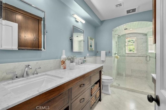 2839 Via Victoria, Palos Verdes Estates, CA 90274 - bathroom featuring a shower stall, toilet, tile patterned flooring, and double vanity