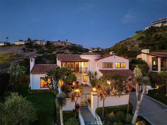 2839 Via Victoria, Palos Verdes Estates, CA 90274 - mediterranean / spanish-style house with a balcony, stucco siding, a tile roof, and a chimney
