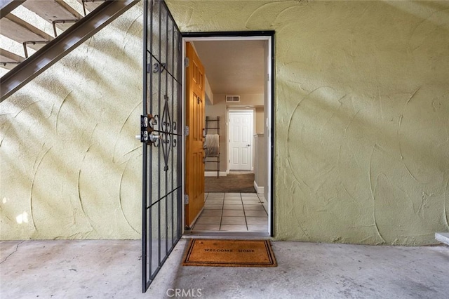 entrance to property with visible vents