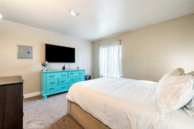 carpeted bedroom featuring electric panel and baseboards