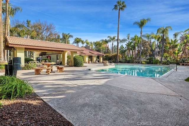 pool with a patio