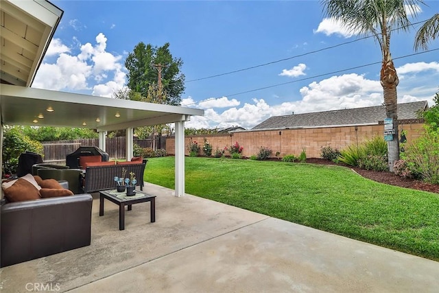 view of patio featuring an outdoor living space, a grill, and a fenced backyard