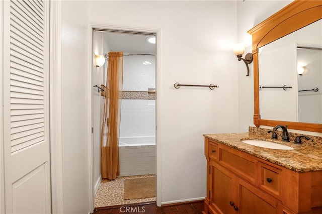 30452 Passageway Pl, Agoura Hills, CA 91301 - full bathroom featuring shower / bath combo with shower curtain, baseboards, wood finished floors, and vanity