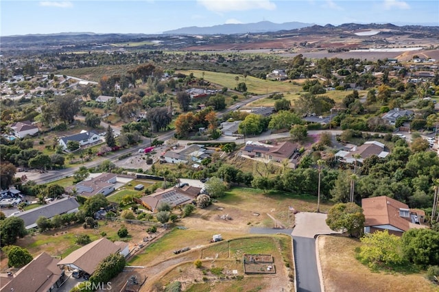 bird's eye view with a residential view and a mountain view