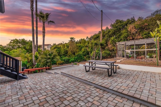 view of property's community featuring a patio area