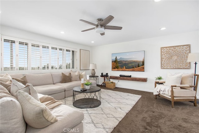 carpeted living area with recessed lighting, a ceiling fan, and baseboards