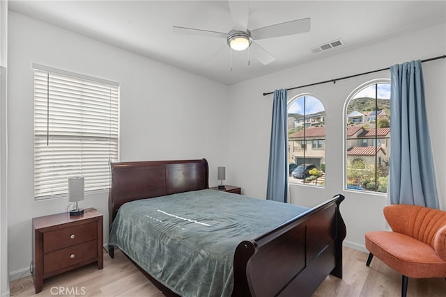 18797 Big Cedar Dr, Canyon Country, CA 91387 - bedroom with a ceiling fan, baseboards, visible vents, and light wood-type flooring