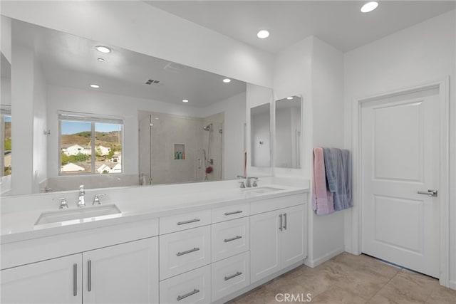 18797 Big Cedar Dr, Canyon Country, CA 91387 - bathroom with visible vents, a sink, a stall shower, and recessed lighting