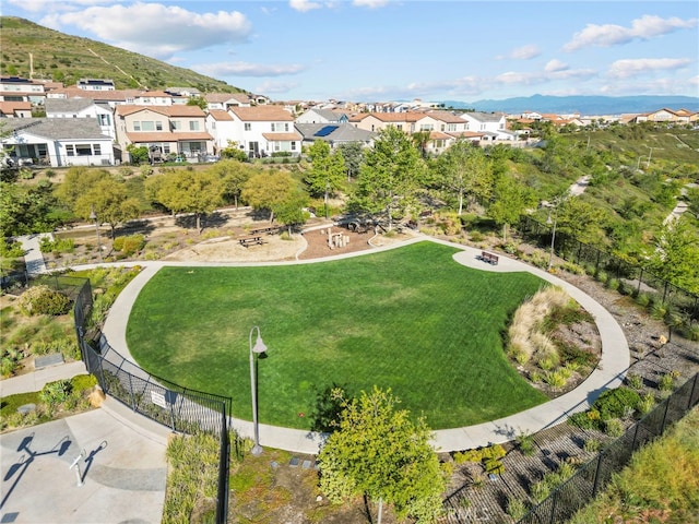 18797 Big Cedar Dr, Canyon Country, CA 91387 - view of community featuring a lawn, a mountain view, a residential view, and fence