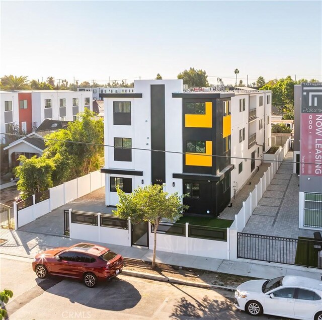 1444 W 37th St, Los Angeles, CA 90018 - view of building exterior with fence