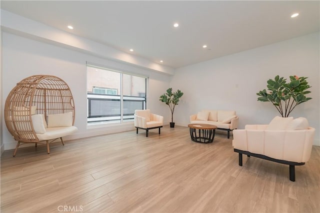 1444 W 37th St, Los Angeles, CA 90018 - sitting room featuring baseboards, light wood-type flooring, and recessed lighting