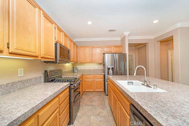 kitchen featuring visible vents, stainless steel appliances, light countertops, and a sink