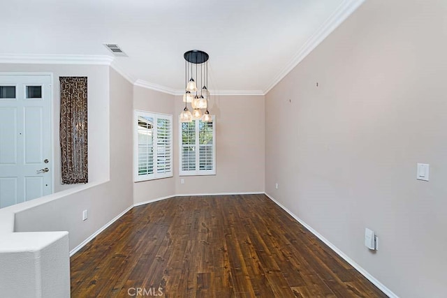 unfurnished dining area with wood finished floors, visible vents, a chandelier, and baseboards