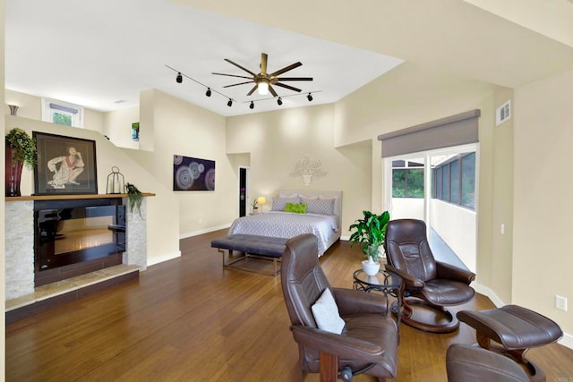 1710 Via Allondra, San Marcos, CA 92078 - bedroom featuring multiple windows, rail lighting, wood finished floors, and visible vents