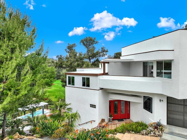 1710 Via Allondra, San Marcos, CA 92078 - view of front facade featuring french doors and stucco siding