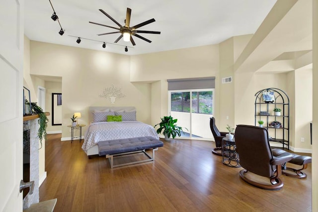 1710 Via Allondra, San Marcos, CA 92078 - bedroom featuring baseboards, rail lighting, wood finished floors, and visible vents