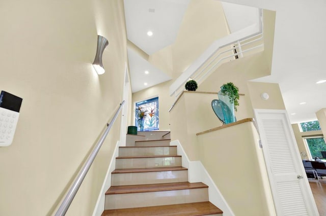 1710 Via Allondra, San Marcos, CA 92078 - staircase featuring recessed lighting, a high ceiling, and wood finished floors