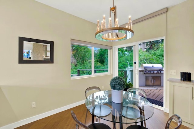 1710 Via Allondra, San Marcos, CA 92078 - dining space featuring baseboards, wood finished floors, and a chandelier