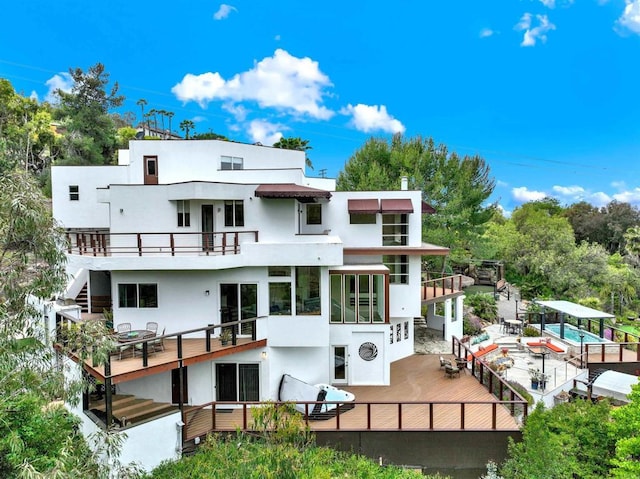 1710 Via Allondra, San Marcos, CA 92078 - back of house featuring a balcony and stucco siding