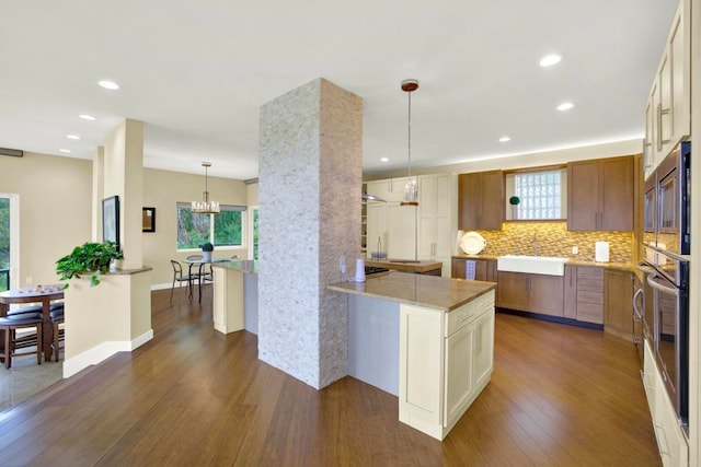 1710 Via Allondra, San Marcos, CA 92078 - kitchen featuring a sink, dark wood finished floors, and a wealth of natural light