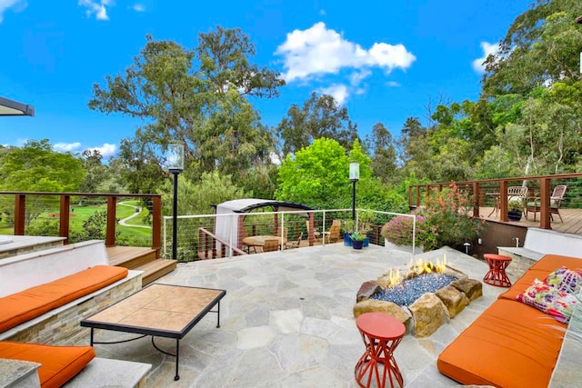 1710 Via Allondra, San Marcos, CA 92078 - view of patio featuring a wooden deck and an outdoor fire pit