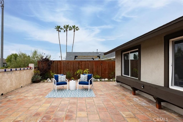 view of patio with fence